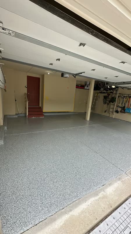 Residential garage flake floor — sealed and ready for vehicles