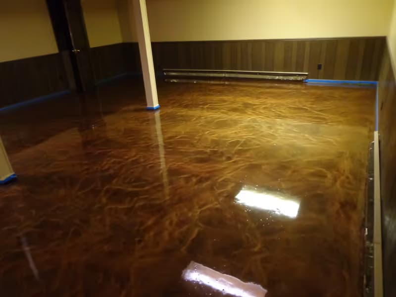 Bronze metallic epoxy floor detail — commercial-grade durability with premium finish