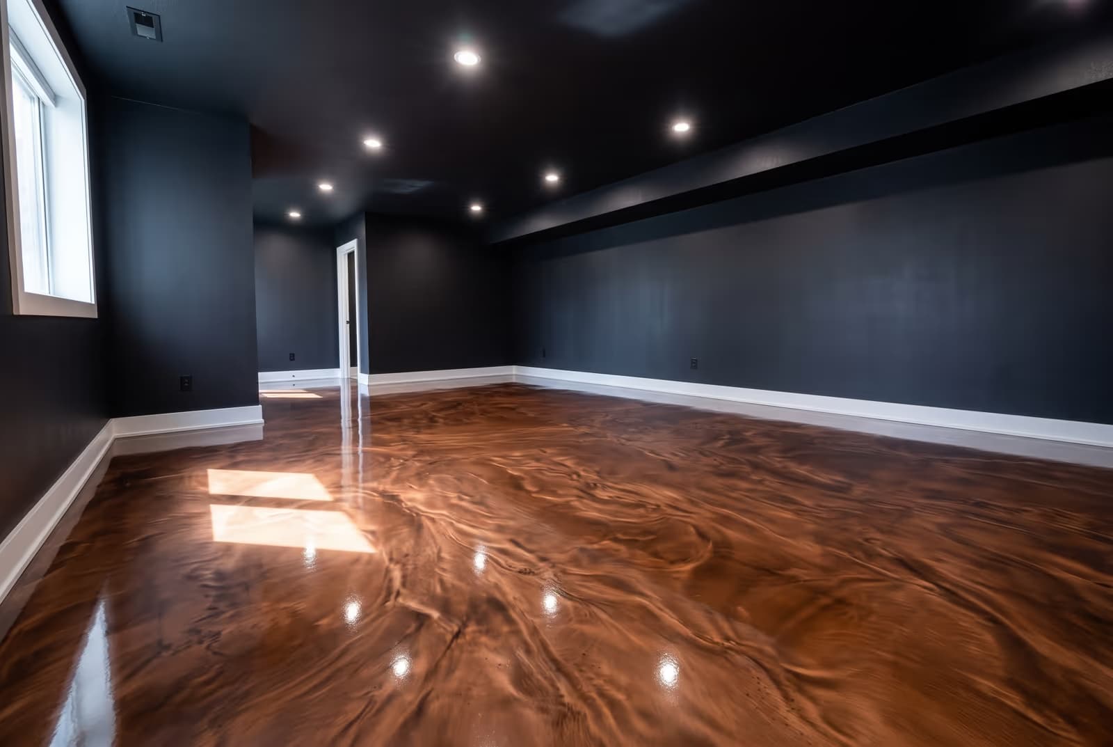 Copper metallic epoxy floor with matte black walls and ceiling