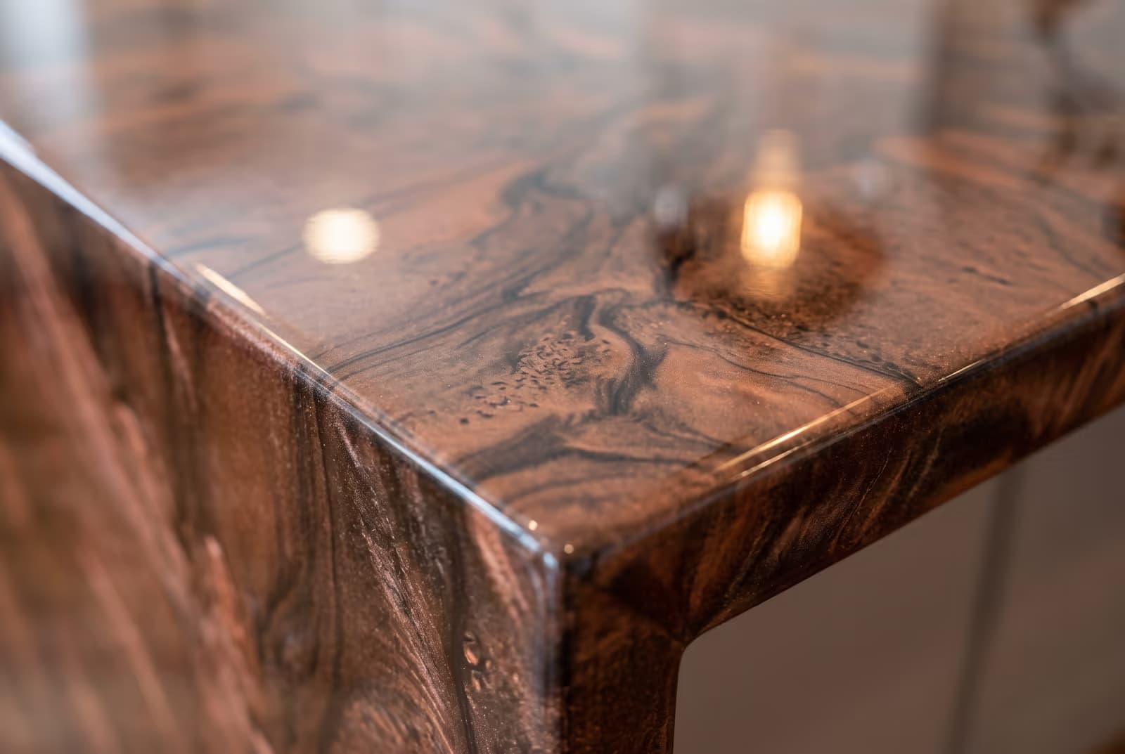 Copper and black metallic epoxy countertop edge detail