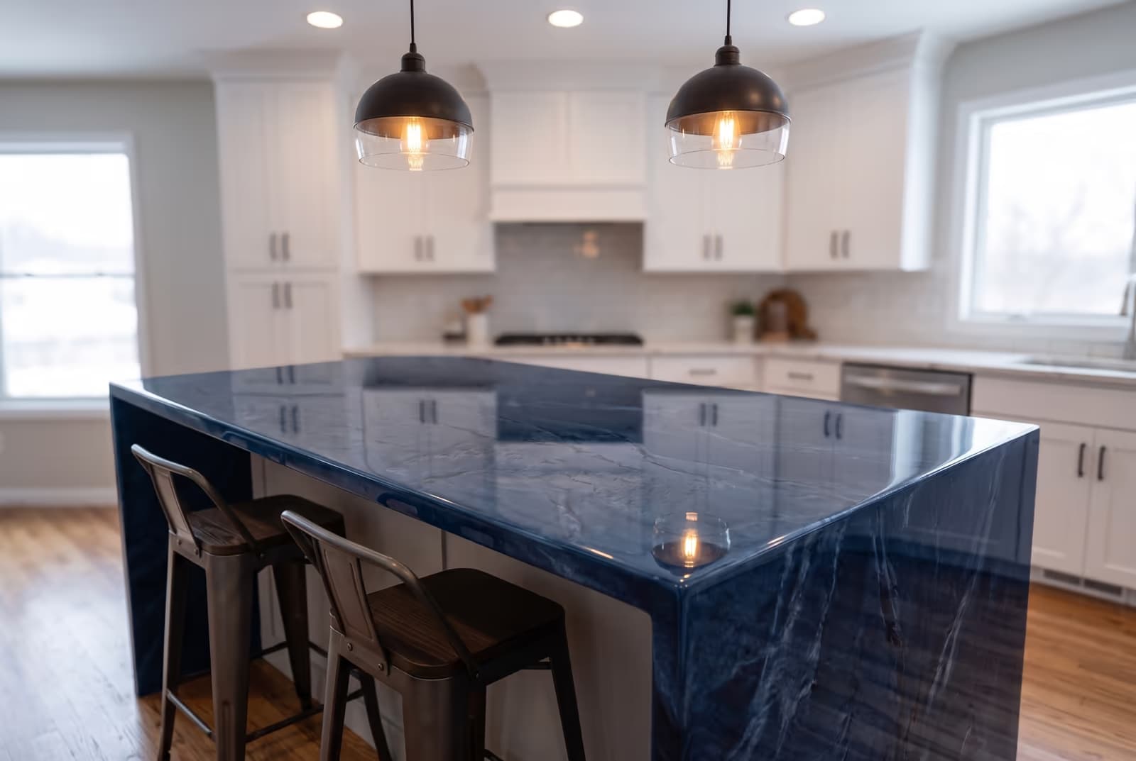 Midnight-blue and steel-pearl metallic epoxy peninsula bar top